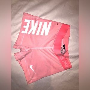 Pink Nike pro shorts